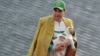 Turkmen President Gurbanguly Berdymukhammedov holds a Turkmen shepherd dog as he takes part in celebrations for the Day of the Horse in Ashgabat in April 2018.