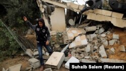 Руіны будынка пасьля ізраільскага паветранага ўдару ў сэктары Газы, 12 лістапада 2018