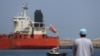 A vessel sits at anchor at the Sultan Qaboos Port in Muscat, Oman, on March 16.
