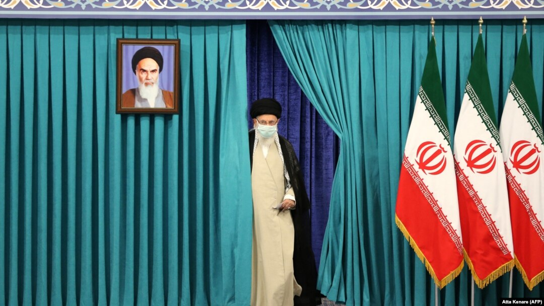 Iranian Supreme Leader Ayatollah Ali Khamenei arrives to cast his ballot in the country's presidential election on June 18. 