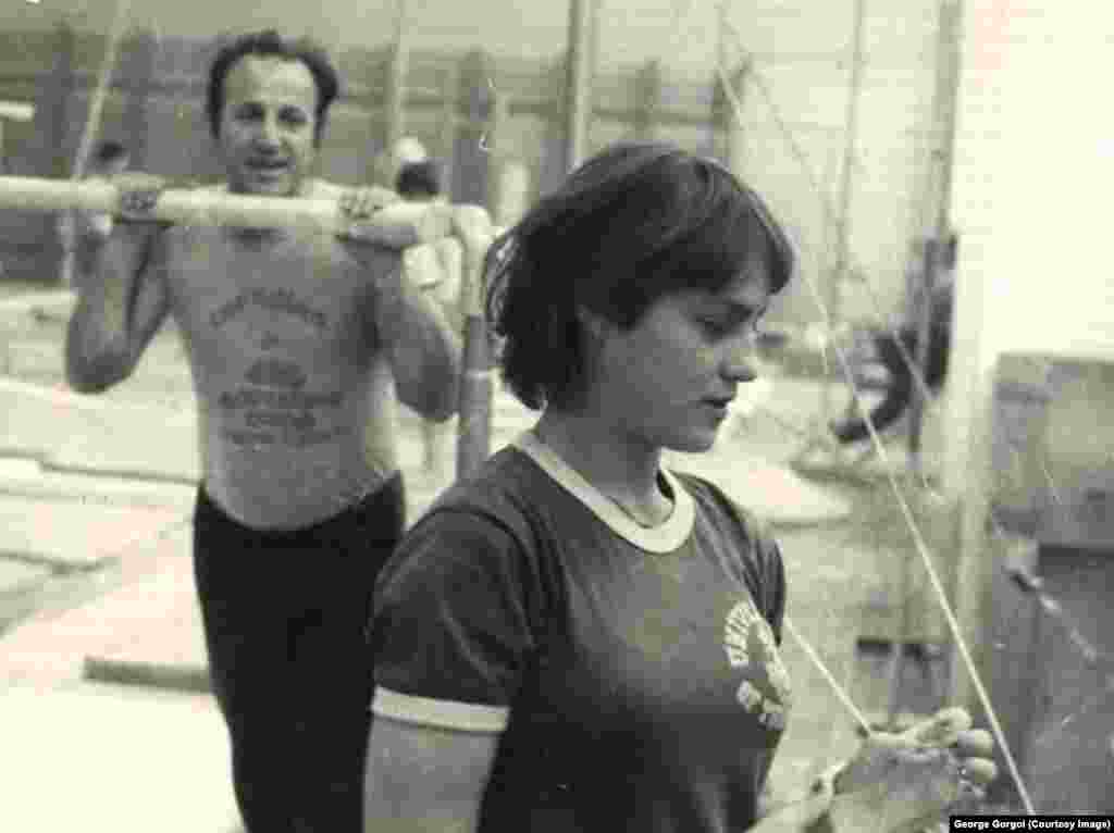 După 1977, Nadia a avut mai mulți antrenori: Iosif Hidi, Gheorghe Condovici, Atanasia Albu, Gheorghe Gorgoi (în fotografie), Anca Grigoraş și a participat la cele mai importante competiții de gimnastică. Până în 1984, când s-a retras din activitatea competițională, Nadia a cucerit 25 de medalii, la Jocuri Olimpice, Campionate Mondiale şi Campionate Europene. 16 sunt de aur. În noiembrie 1989, a fugit în Statele Unite ale Americii.