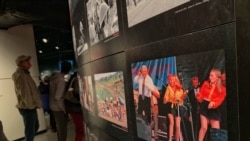 An exhibit at Newseum features Pulitzer Prize winning photos, one of which is of former Russian President Boris Yeltsin dancing.
