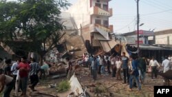 На месте взрывов в индийском городе Петлавад (12 сентября 2015 года) 