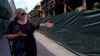 After Fleeing Mariupol, Ukrainian Woman's New Life Destroyed In Russian Attack GRAB 2