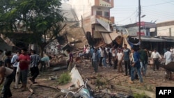 На месте взрывов в индийском городе Петлавад (12 сентября 2015 года)
