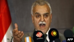 Vice President Tariq al-Hashimi speaks at his December 20 press conference in Irbil.