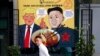 Плакат с изображениями Дональда Трампа и Ким Чен Ына в Сингапуре