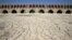 In this Tuesday, July 10, 2018 photo, the Zayandeh Roud river no longer runs under the 400-year-old Si-o-seh Pol bridge, named for its 33 arches, in Isfahan, Iran. 