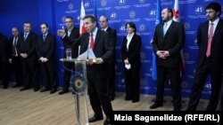 Georgian Prime Minister-nominee Bidzina Ivanishvili speaks during a ceremony to present new ministerial nominees at his office in Tbilisi on October 16, including Kakha Kaladze (right).