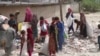Displaced And Desperate, Afghan Kids Search Trash For Food