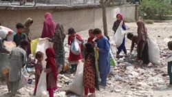 Displaced And Desperate, Afghan Kids Search Trash For Food