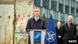 Jens Stoltenberg speaks outside NATO headquarters in Brussels on November 6.