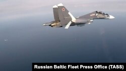 Su-27, avion de luptă al forțelor aeriene rusești în timpul unor manevre anunțate, peste Marea Baltică, 2020. 