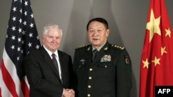 U.S. Defense Secretary Robert Gates (left) and his Chinese counterpart, General Liang Guanglie, held talks today in Hanoi.