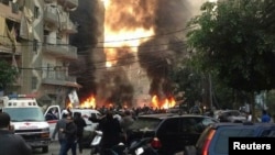 Fire and smoke billows from the site of an explosion in Beirut's southern suburbs on January 2.