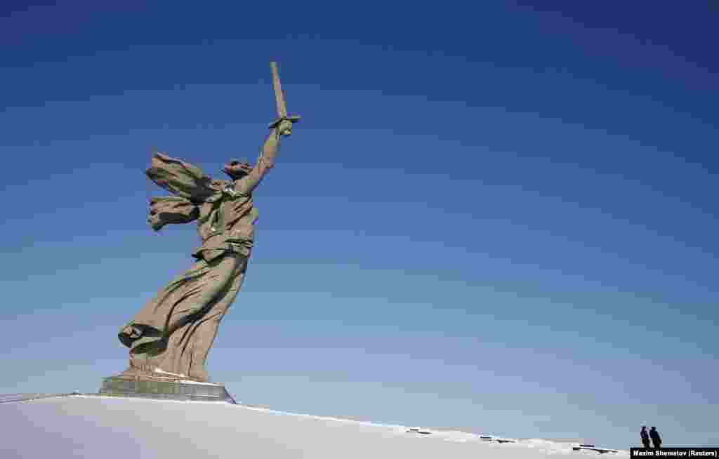 Police officers stand near The Motherland Calls monument in Volgograd on February 2. (Reuters/Maxim Shemetov)