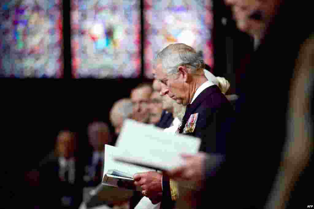 Britain&#39;s Prince Charles listens to the service during a British D-Day commemoration ceremony at Bayeux Cathedral.