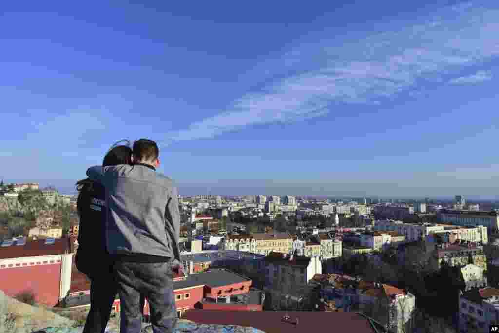 A couple takes in a view of Plovdiv,&nbsp;the first Bulgarian city to become a European Capital of Culture. The EU initiative is intended to celebrate the diversity of cultures in Europe, boost tourism, and support the cultural life of the selected cities.&nbsp;