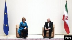 Координатор зовнішньої політики ЄС Катрін Аштон та міністр закордонних справ Ірану Могаммад Джавад Заріф, Женева, 15 жовтня 2013 року