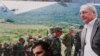 A man in the Abkhaz capital, Sukhumi, walks past a campaign poster of leader Sergei Bagapsh.