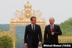 Президент Франції Емманюель Макрон та президент Росії Володимир Путін під час зустрічі у Версалі. Франція, 29 травня 2017 року