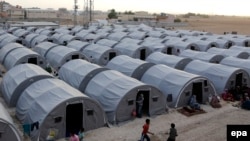 A refugee camp for Syrian Kurds fleeing the violence in Kobani in Turkey's Suruc district