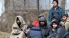 Pitanje migranta na Zapadnom Balkanu zauzima veliki deo izveštaja Amnesti Internešnala o ljudskim pravima za 2109., a preneto je i u narednu godinu (na slici grupa migranata nedaleko od Tuzle, na severoistoku BiH, marta 2020.) 
