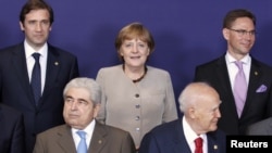 European Union leaders pose for a "family portrait" ahead of the two-day summit in Brussels.