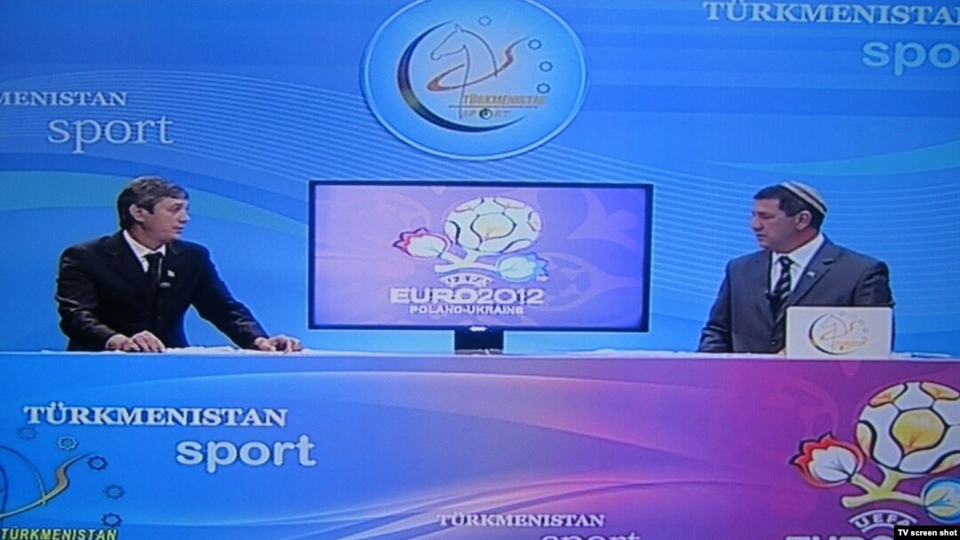 Commentators from Turkmenistan Sport discuss the Euro 2012 football championship live during a broadcast on June 11.