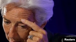 France -- International Monetary Fund Managing Director Christine Lagarde attends a conference about the future of the Euro zone organized by the Robert Schuman foundation in Paris in this July 18, 2014 file picture. 