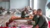 Afghanistan -- photo report on Taliban rounding up and forcefully incarcerating drug addicts for detox. 