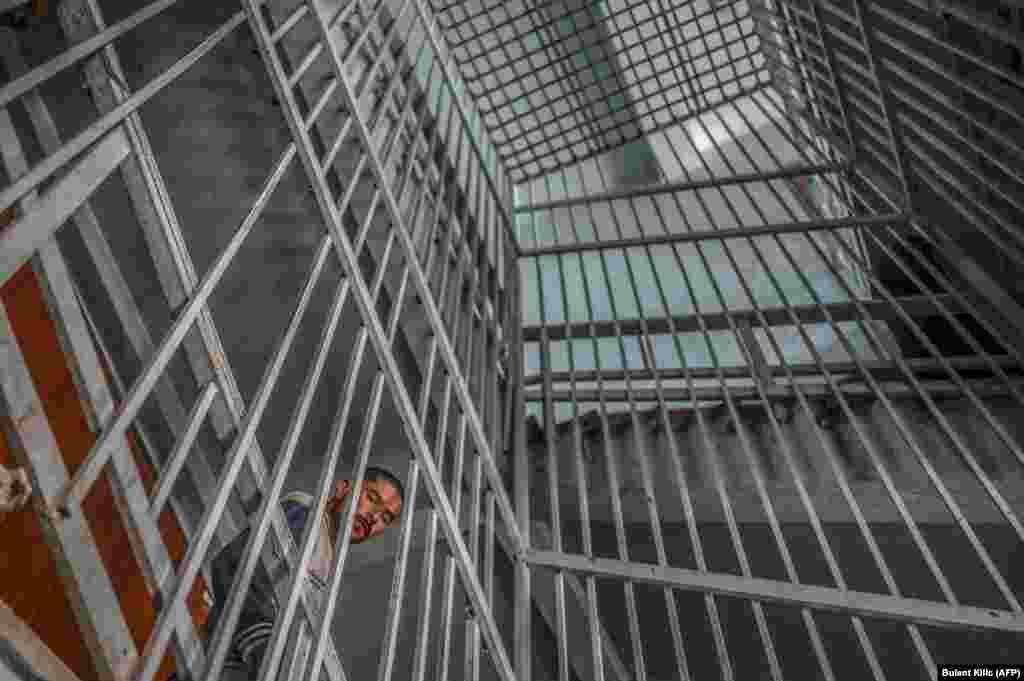 A patient stands on the stairs at the Avicenna Medical Hospital for Drug Treatment in Kabul on October 16.