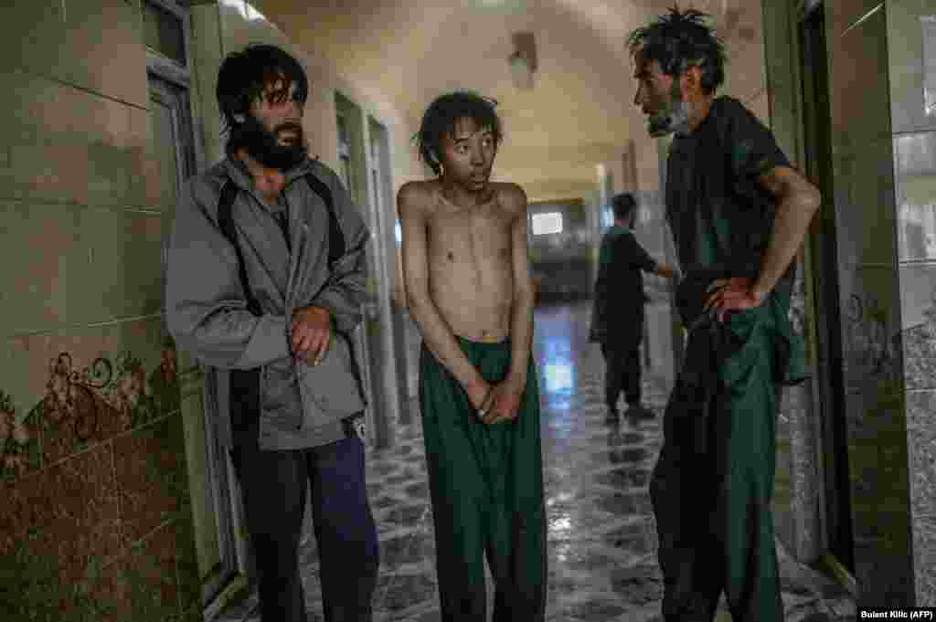 Patients wait to take showers in the detoxification ward of the Avicenna Medical Hospital for Drug Treatment in Kabul.