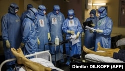 Medics work in an intensive care unit for Covid-19 patients in an emergency hospital in Moscow on October 20. 