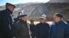 Kyrgyz Energy Minister Doskul Bekmurzaev (second from right) is shown inspecting the Kara-Keche coal mine in the Naryn region in October 2021.
