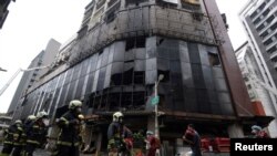Izgorjela zgrada od 13 spratova, a prvih pet bilo je za komercijalnu upotrebu, Tajvan, 14. oktobar 2021.