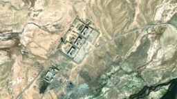 Next to an old Soviet outpost, is this a collection of strategically located buildings and lookout towers in Tajikistan controlled by Chinese troops part of Beijing's nascent but growing hard-power footprint in the region?