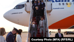 Afghan President Ashraf Ghani (lower left), High Council for National Reconciliation Chairman Abdullah Abdullah (above), and other delegation members arrive in the United States ahead of talks with President Joe Biden.