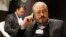 Saudi journalist Jamal Khashoggi speaks on his phone at the World Economic Forum in Davos in 2011.