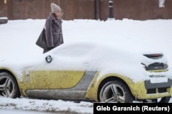 Киянка на засніженій вулиці. 14 січня 2026 року