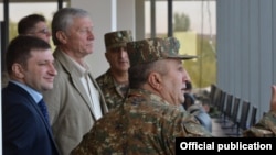 Armenia - CSTO Secretary General Nikolay Bordyuzha (second from left) watches the concluding session of CSTO military exercises at Bagramian shooting range, 3Oct2015.