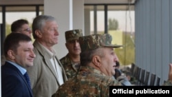 Armenia - CSTO Secretary General Nikolay Bordyuzha (second from left) watches the concluding session of CSTO military exercises at Bagramian shooting range, 3Oct2015.