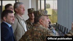 Armenia - CSTO Secretary General Nikolay Bordyuzha (second from left) watches the concluding session of CSTO military exercises at Bagramian shooting range, 3Oct2015.