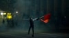 KYRGYZSTAN -- A protester waves a Kyrgyz flag during a rally against the results of a parliamentary vote in Bishkek, October 5, 2020