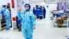 Afghan Doctor Fights On The Front Line Of Iran's Coronavirus Battle