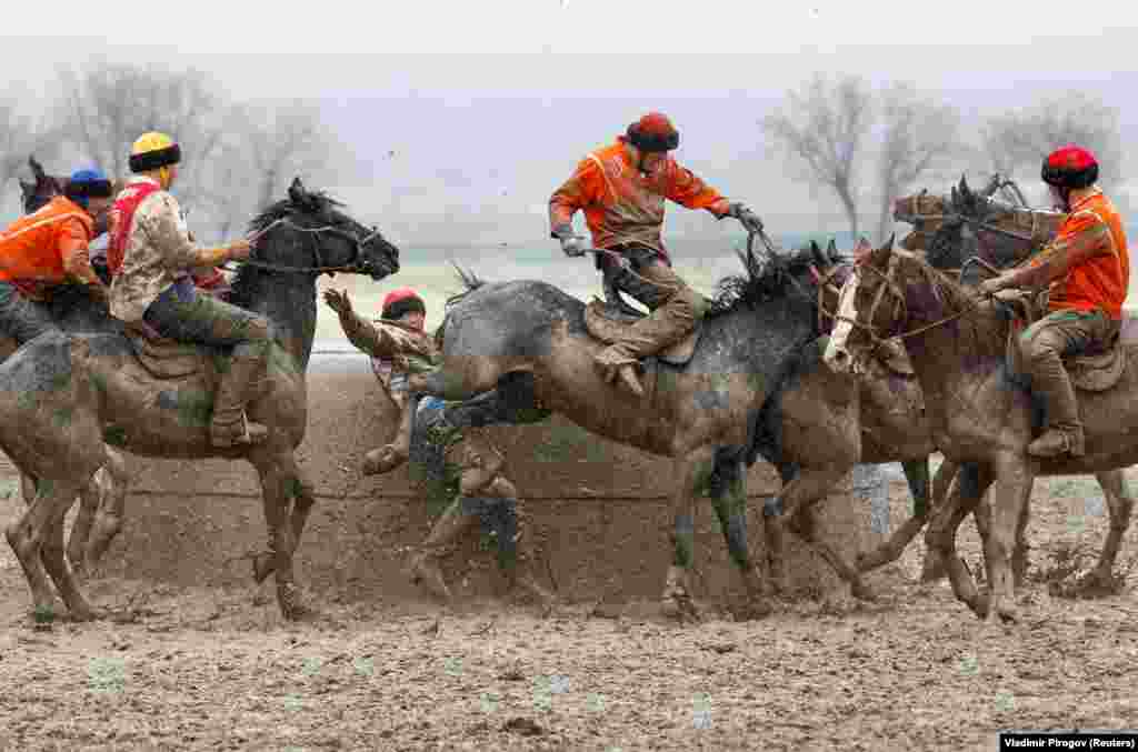 Riders take part in a regional Kok-Boru competition in the Kyrgyz village of Sokuluk. (Reuters/Vladimir Pirogov)