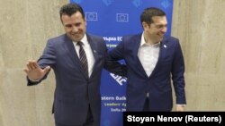 Greek Prime Minister Alexis Tsipras (right) meets with Macedonian Prime Minister Zoran Zaev at the EU-Western Balkans summit in Sofia on May 17.