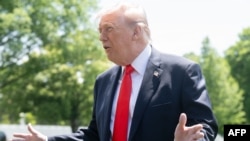 US President Donald Trump speaks with the media prior to departing from the the White House on May 1.