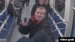 A screen shot from CCTV footage of a bizarre shooting attack that occurred on the Moscow Metro on November 17.