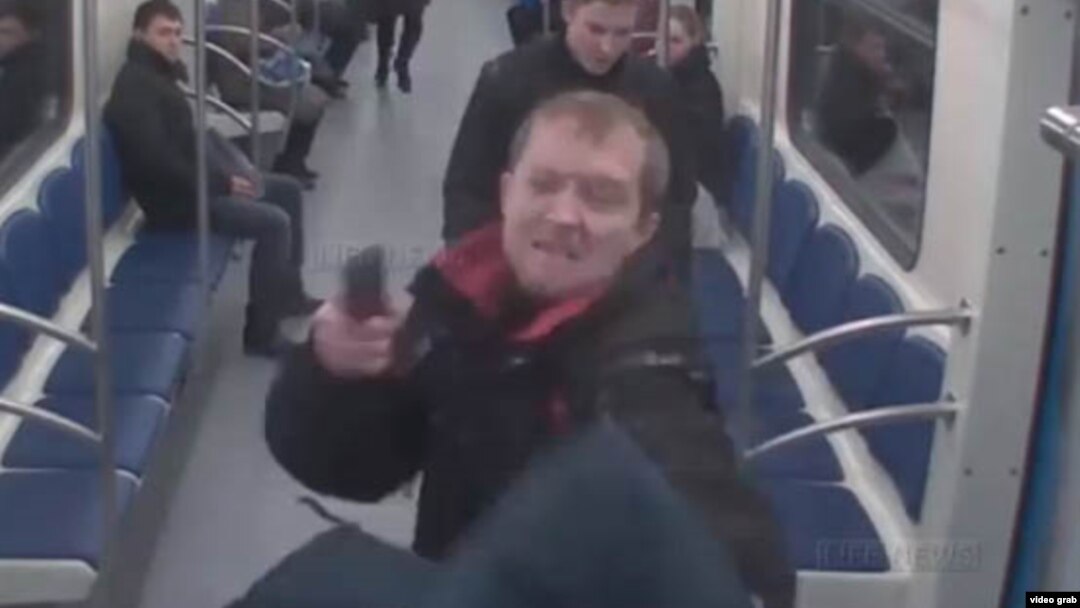 A screen shot from CCTV footage of a bizarre shooting attack that occurred on the Moscow Metro on November 17.